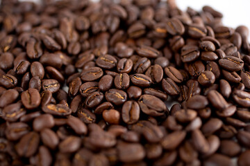A closeup view of coffee beans, as a background.