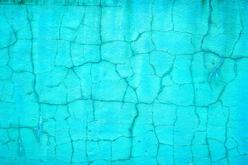 Rough vintage cracked bright green stucco background