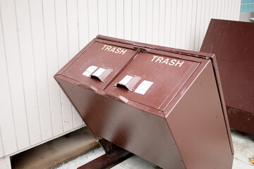 A view of some animal proof trash cans.