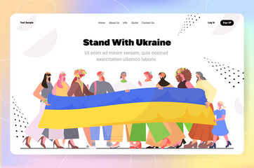 mix race people holding Ukrainian flag pray for Ukraine peace save Ukraine from russia stop war concept