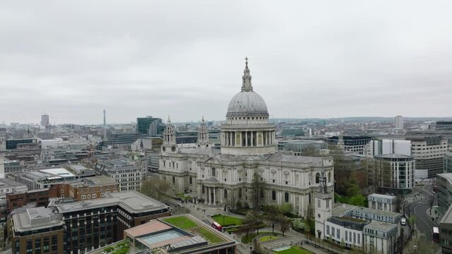 St. Paul's Cathedral Against Overcast Sky In London, England. Aerial Wide Shot