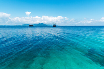 View of azure colored, clean and transparent water with ripple and pattern in Semporna, Sabah,...