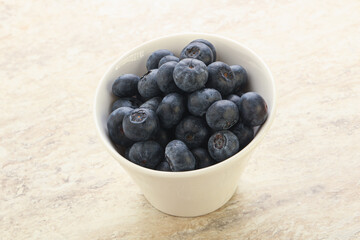 Sweet ripe blueberry heap in the bowl