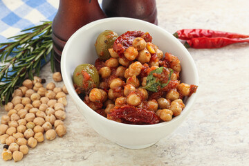 Chickpea beans with dry tomato and olives