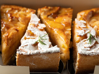 sliced apple tart in box