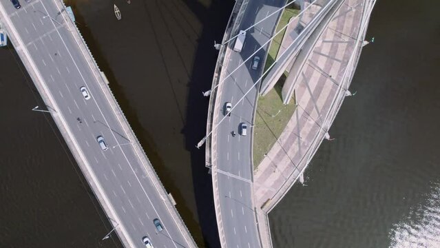 Overhead drone shot of a bridge and traffic in Recife, Brazil