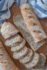 Home made fresh french Baguette loafs on a table