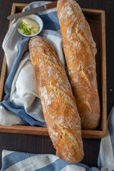 Home made fresh french Baguette loafs on a table