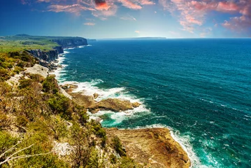 Foto op Plexiglas Sunset over a rocky coast in Australia © Fyle