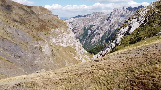 Woman Hikes Mountain Trail at Prokletije National Park, Montenegro - Circle Pan