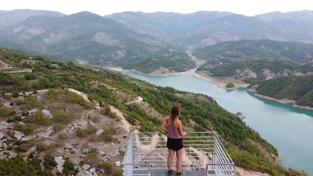 Woman Walks the Stairs at Viewpoint Lake Bovilla, Albania - Dolly Follow Behind