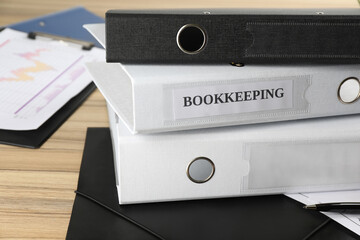 Stack of folders on desk in office. Bookkeeper's workplace