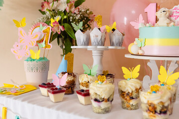 sweet counter with cakes and candies