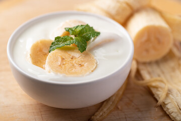 Yogurt with banana in bowl, Healthy eating