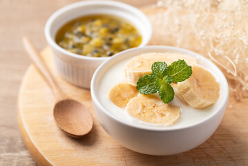 Yogurt with banana in bowl, Healthy eating