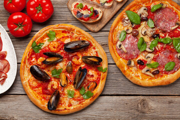 Italian cuisine. Pizza and toasts