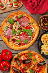 Italian cuisine. Pizza, pasta and toasts