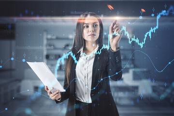 Portrait of attractive young european businesswoman using growing forex chart and dot map hologram...