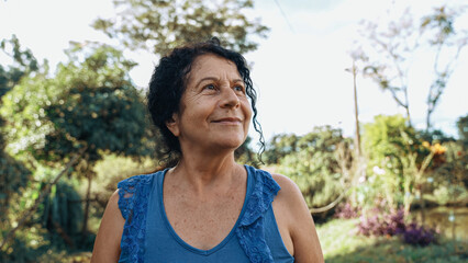 Smiling latin Brazilian woman in the farm. Joy, positive and love. - obrazy, fototapety, plakaty