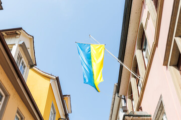 A Ukrainian flag hangs on a house in the old town of Lindau as a sign of solidarity