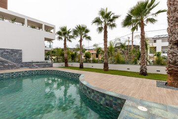 Outdoor hotel swimming pool in a sea resort