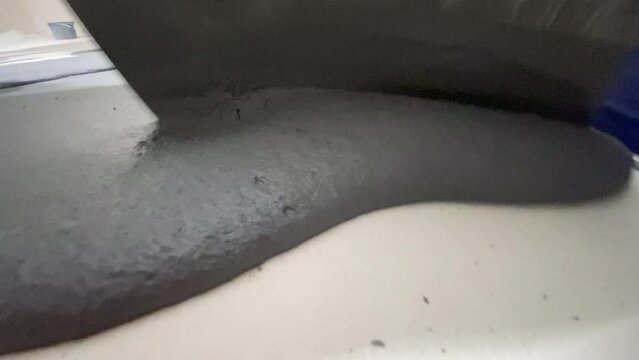 Applying a decorative microcement coating to the floor