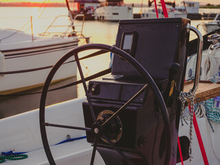 sailing yacht steering wheel, close up view