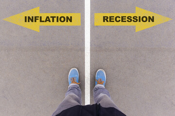 Inflation or recession choice, text on asphalt ground, feet and shoes on floor - obrazy, fototapety, plakaty