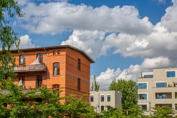 Germany, Berlin, Clouds over modern apartment buildings in new development area