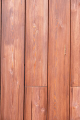 Naklejka premium The background is made of brown boards, the whole frame.