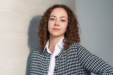 Beautiful woman with brown curly hair