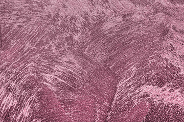 Texture of pink decorative plaster or concrete.