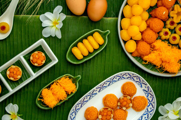 Thai traditional dessert concept, Assorted thai desserts served in a plate for auspicious day - obrazy, fototapety, plakaty