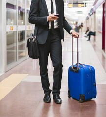 Anonymous businessman commuting in the city.