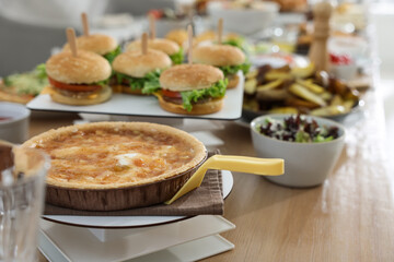Brunch table setting with different delicious food indoors