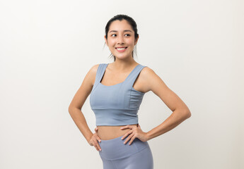 Young beautiful asian woman with sportswear on isolated white background. Portrait sporty woman standing pose exercise workout in studio.