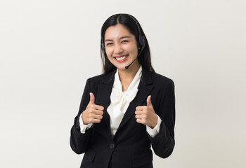 Happy young asian business woman call centre thumb up. Welcome female operator put on smalltalk...