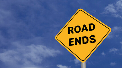Roads End Road Sign on Clear Blue Sky with Rapid Moving Clouds for Text Placement