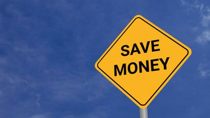 Save Money Road Sign on Clear Blue Sky with Rapid Moving Clouds for Text Placement