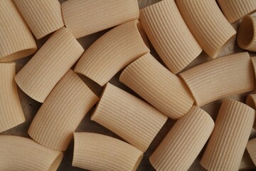 Italian dry pasta in the form of empty corrugated thick tubes