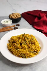 Soya chunks Biryani. Basmati rice cooked with Soyabean or Soya vadi along with spices and vegetables. It's a complete protein rich and nutritious one pot meal. Copy space