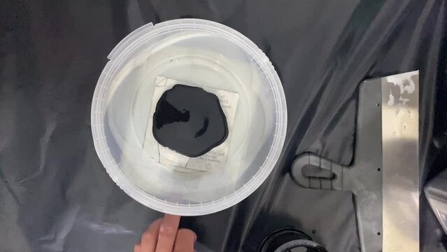 The process of combining the ingredients of the building mixture
