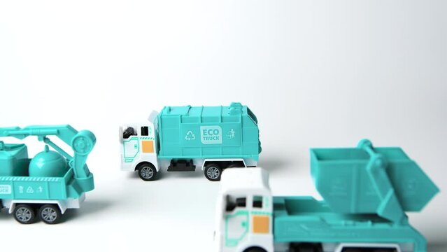 Trucks model and Garbage truck with logo Eco truck and recycle bin symbol on white background                                       