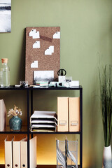 Shelves with binders, documents and sticky notes in office of psychologist