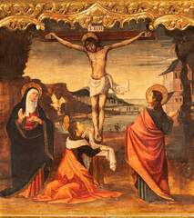 VALENCIA, SPAIN - FEBRUARY 14, 2022: The painting of Crucifixion on the side altar  in the...