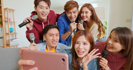 friends take selfies sing