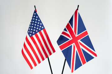 State flags of United States of America and United Kingdom on white background. USA and UK flags