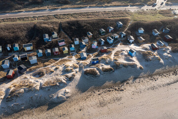 Tisvildeleje, Denmark - January 21, 2022: Aerial drone view of wooden beach huts in the sand dunes - obrazy, fototapety, plakaty