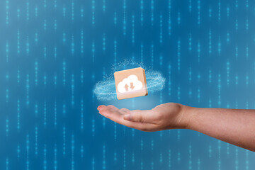 Woman hand showing icon cloud computing with blue background and copy space. Cloud technology. Data storage. Networking and internet service concept.