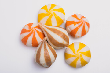 Colorful Japanese style fish balls on a white background.